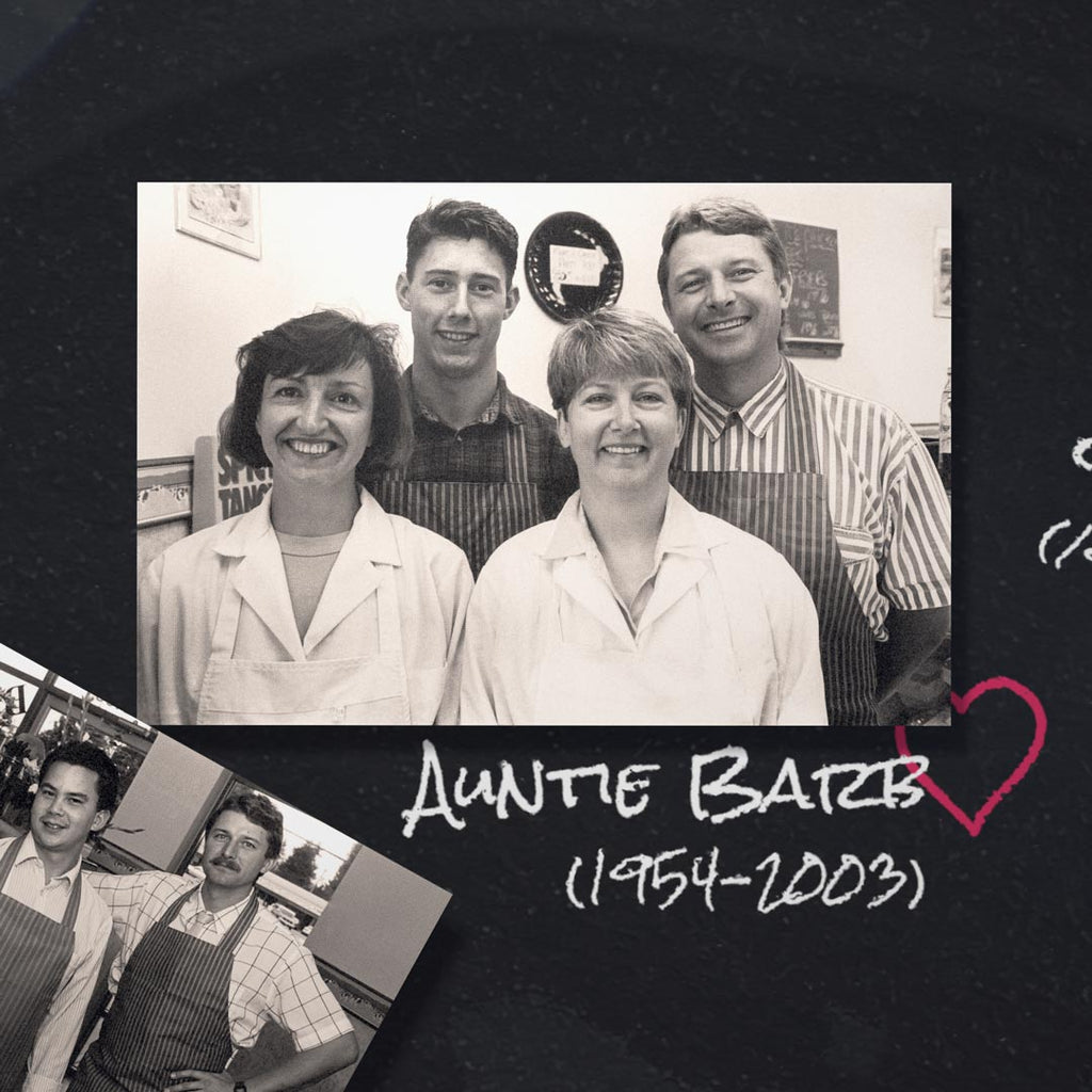 A collage of a couple black and white photos laying on a chalkboard depicting a young family of butchers.