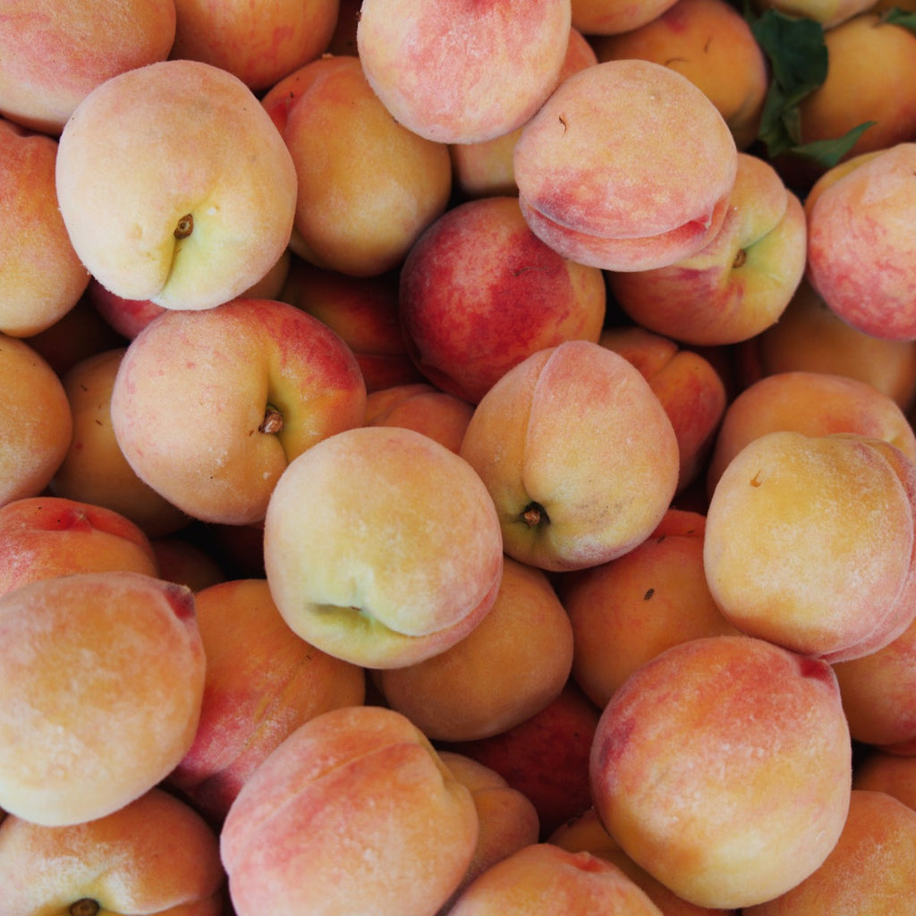 A pile of fresh local Okanagan peaches.